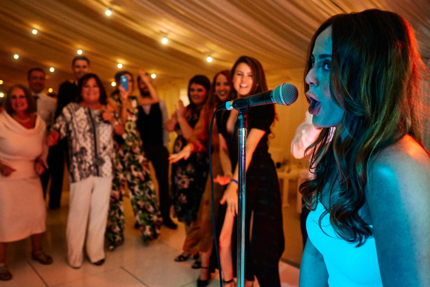 Bride sings at her wedding