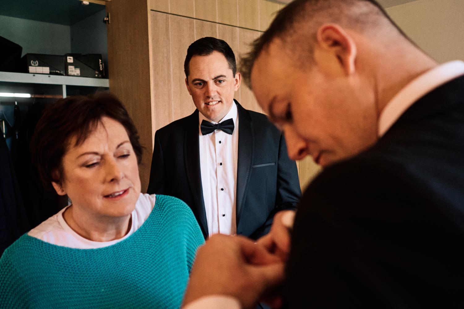 Groom gets ready at Farnham Estate