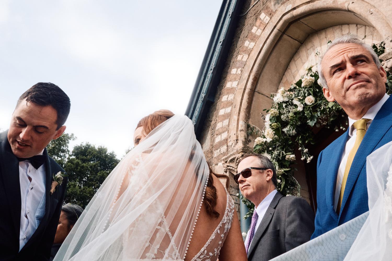 Wedding guests exit a chapel in Ireland