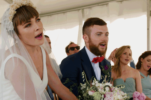 singing bride and groom